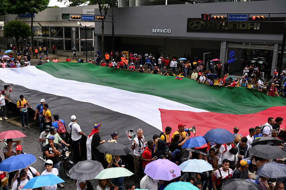  Supporters of Venezuelan President Nicolas Maduro hold a march towards the UN headquarters in Caracas in support of Palestinians, amid the ongoing conflict between Israel and Hamas, and against attacks on Lebanon, in Caracas, Venezuela, October 5, 2024. Photo: Reuters 