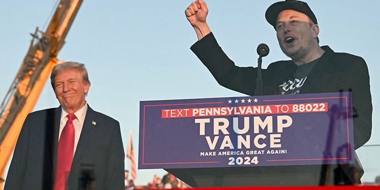 Elon Musk makes his first appearance at a Trump rally and casts the election in dire terms