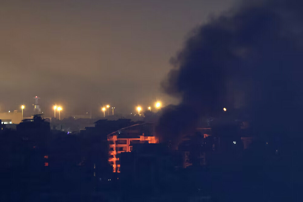  Smoke billows over Beirut southern suburbs after a strike, amid the ongoing hostilities between Hezbollah and Israeli forces, as seen from Sin El Fil, Lebanon. Photo: Reuters 