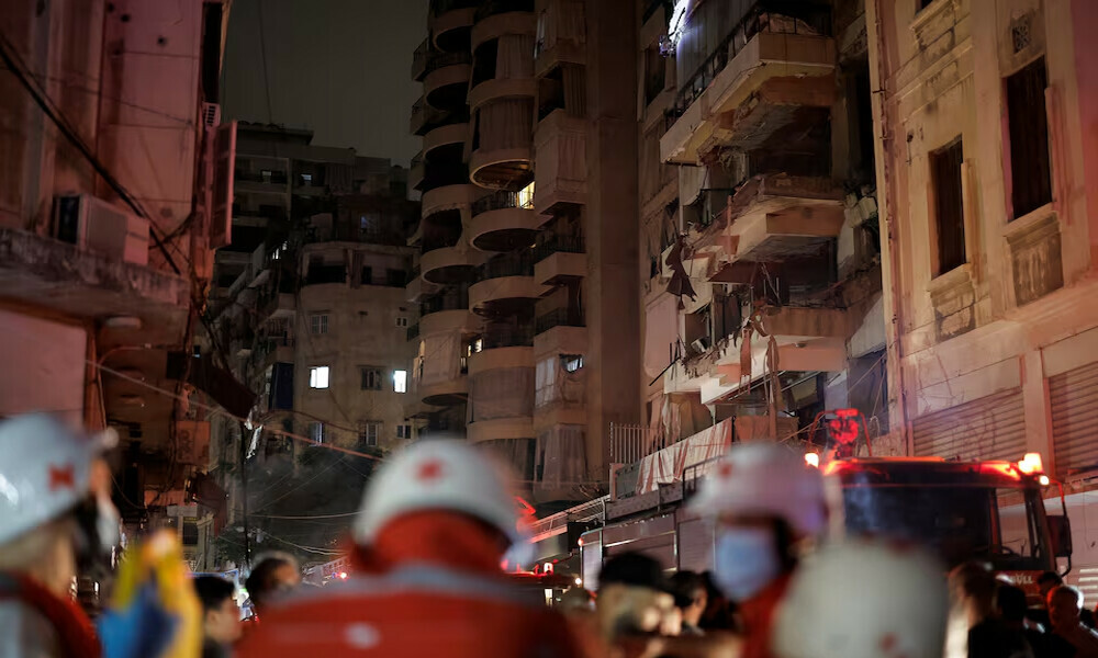  Members of the Red Cross stand near a damaged building at the site of an Israeli air strike, amid ongoing hostilities between Hezbollah and Israeli forces, in Ras Al- Nabaa, in Beirut, Lebanon. Photo: Reuters 