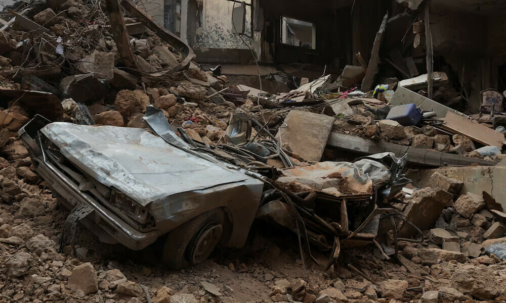  A view shows a damaged car and debris at a site of an Israeli strike, amid ongoing hostilities between Hezbollah and Israeli forces, in Beirut, Lebanon, October 12, 2024. Photo: Reuters 