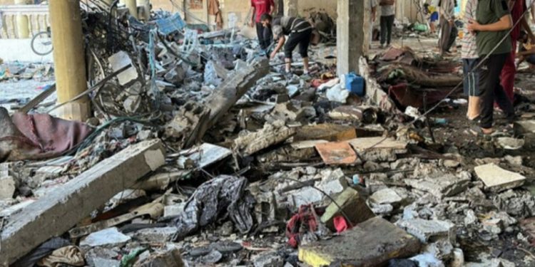 At least 17 Palestinians killed in Israeli strike on school in central Gaza, hospital says