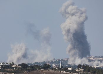 Hezbollah warns of more rockets unless Israel ends air and ground attacks