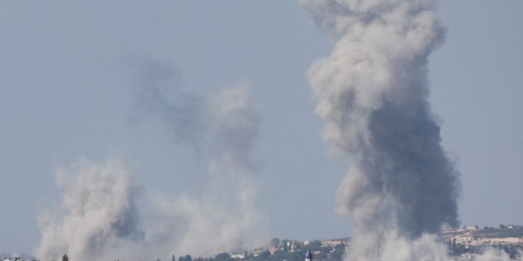 Hezbollah warns of more rockets unless Israel ends air and ground attacks