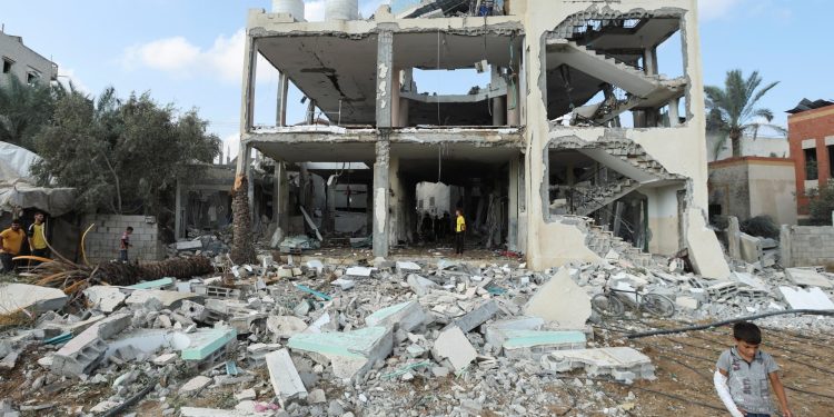 Israel kills 26 in attack on Gaza mosque, school; orders more evacuations