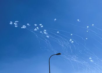 Israel says missiles launched from Iran; residents flee for shelters