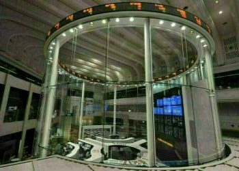 Japan’s Nikkei firms on Fast Retailing, chip share gains