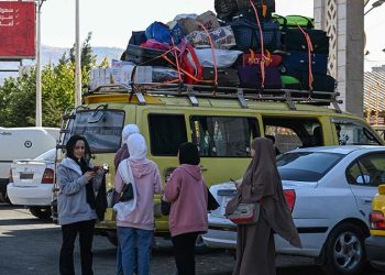 Lebanon says over 400,000 fled to Syria in around 2 weeks