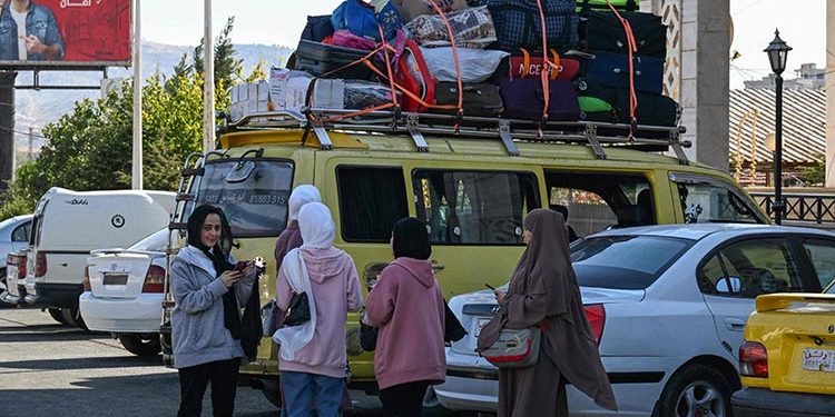 Lebanon says over 400,000 fled to Syria in around 2 weeks