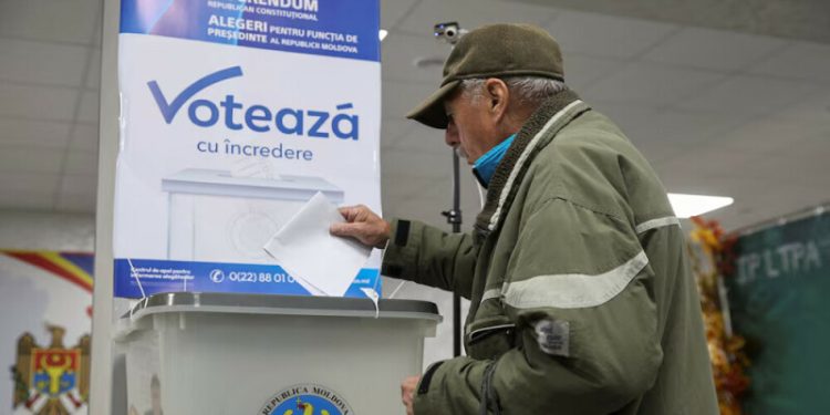 Moldova votes in election, EU referendum in shadow of alleged Russian meddling