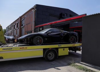 authorities remove vehicles from andrew tate s residence in voluntari near bucharest romania august 24 2024 photo reuters