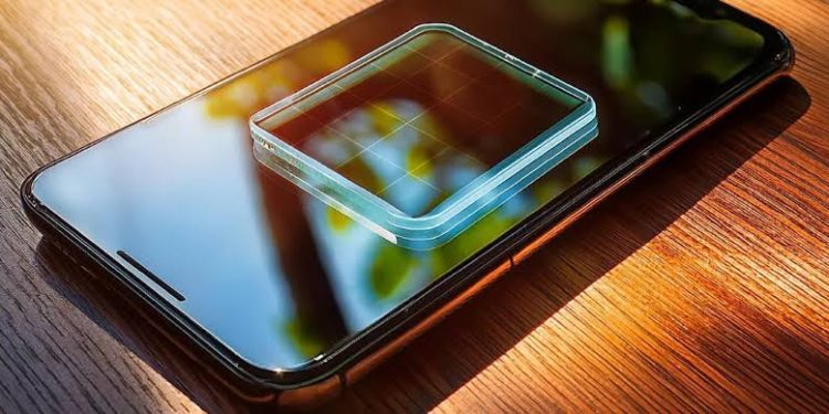 Scientists Develop Transparent Solar Cells that Charge Smartphones through Screens