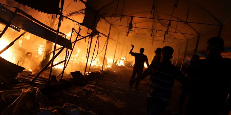 ‘Burned and charred bodies’ as Israel hits tents at central Gaza hospital