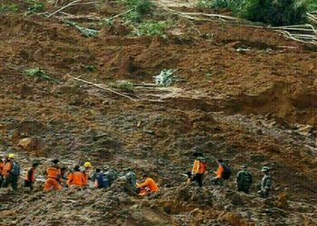 Indonesia digs out as flooding, landslide death toll hits 20