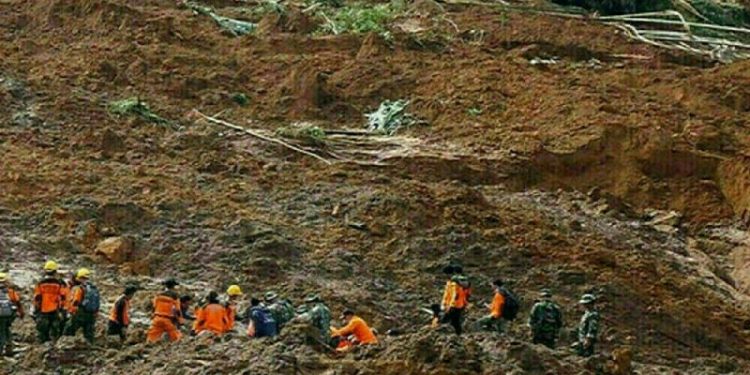 Indonesia digs out as flooding, landslide death toll hits 20
