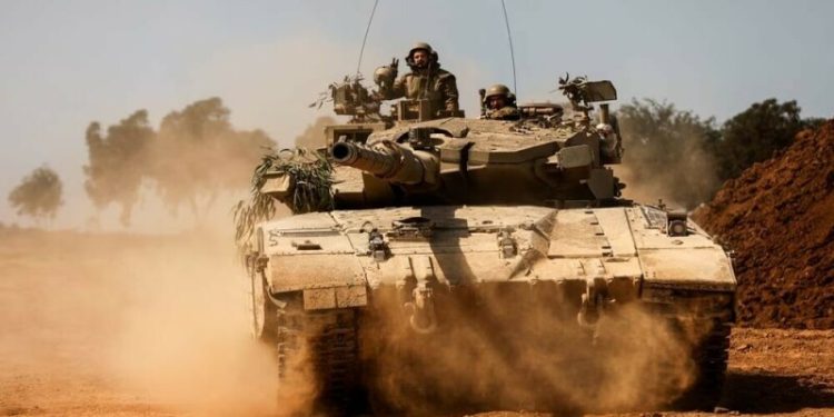 Israeli tanks retreat from central Gaza camp, medics say 30 killed