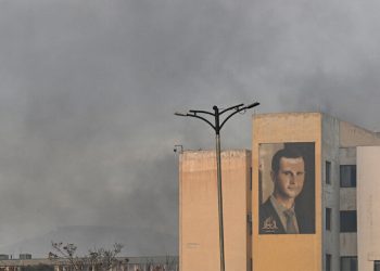 Whereabouts of Syria’s Assad unknown with army officers saying he boarded flight