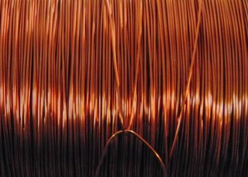 Copper rebounds from 5-week low, firmer dollar caps gains