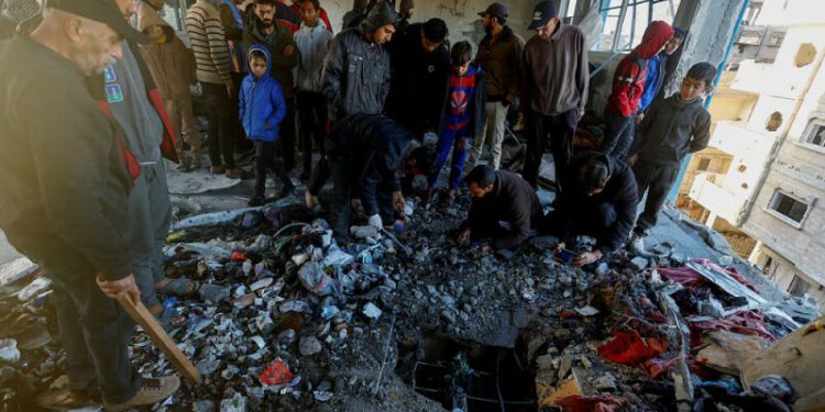 Palestinians mourn after Israeli strike kills at least 20, including children, on Gaza’s Khan Younis