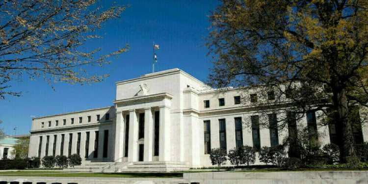 US Fed cuts rate by quarter-point in third straight reduction