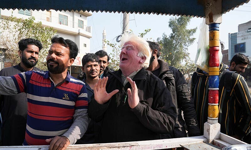 Saleem Bagga, seen by some as a lookalike of US President-elect Donald Trump along a road in Sahiwal, Pakistan January 13, 2025 — Reuters