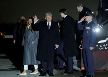 Donald Trump arrives in Washington as inauguration celebrations begin with Elvis impersonator, fireworks