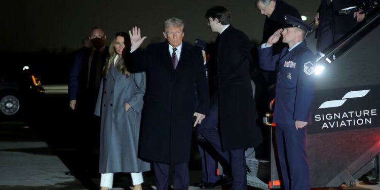 Donald Trump arrives in Washington as inauguration celebrations begin with Elvis impersonator, fireworks