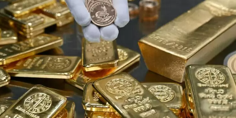 Gold jumps to near all time-high, set for weekly gain