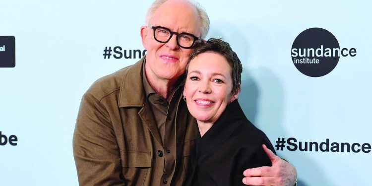 john lithgow and olivia colman began the proceedings photo file
