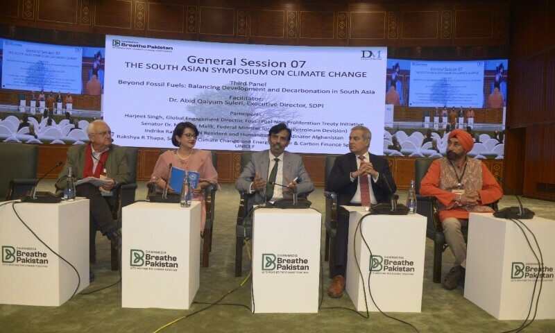 A panel on how to move beyond fossil fuels. — Tanveer Shahzad/Mohammad Asim