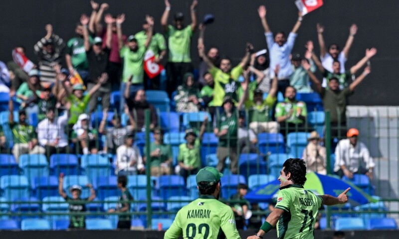 Pakistan’s Naseem Shah (R) celebrates with Kamran Ghulam after taking the wicket of New Zealand’s Kane Williamson during the ICC Champions Trophy cricket match between Pakistan and New Zealand at the National Stadium in Karachi on February 19, 2025. — AFP