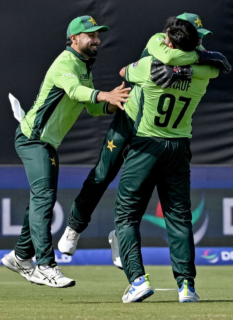 Pakistan’s Haris Rauf (R) celebrates with teammates after taking the wicket of New Zealand’s Daryl Mitchell during the ICC Champions Trophy cricket match between Pakistan and New Zealand at the National Stadium in Karachi on February 19, 2025. — AFP