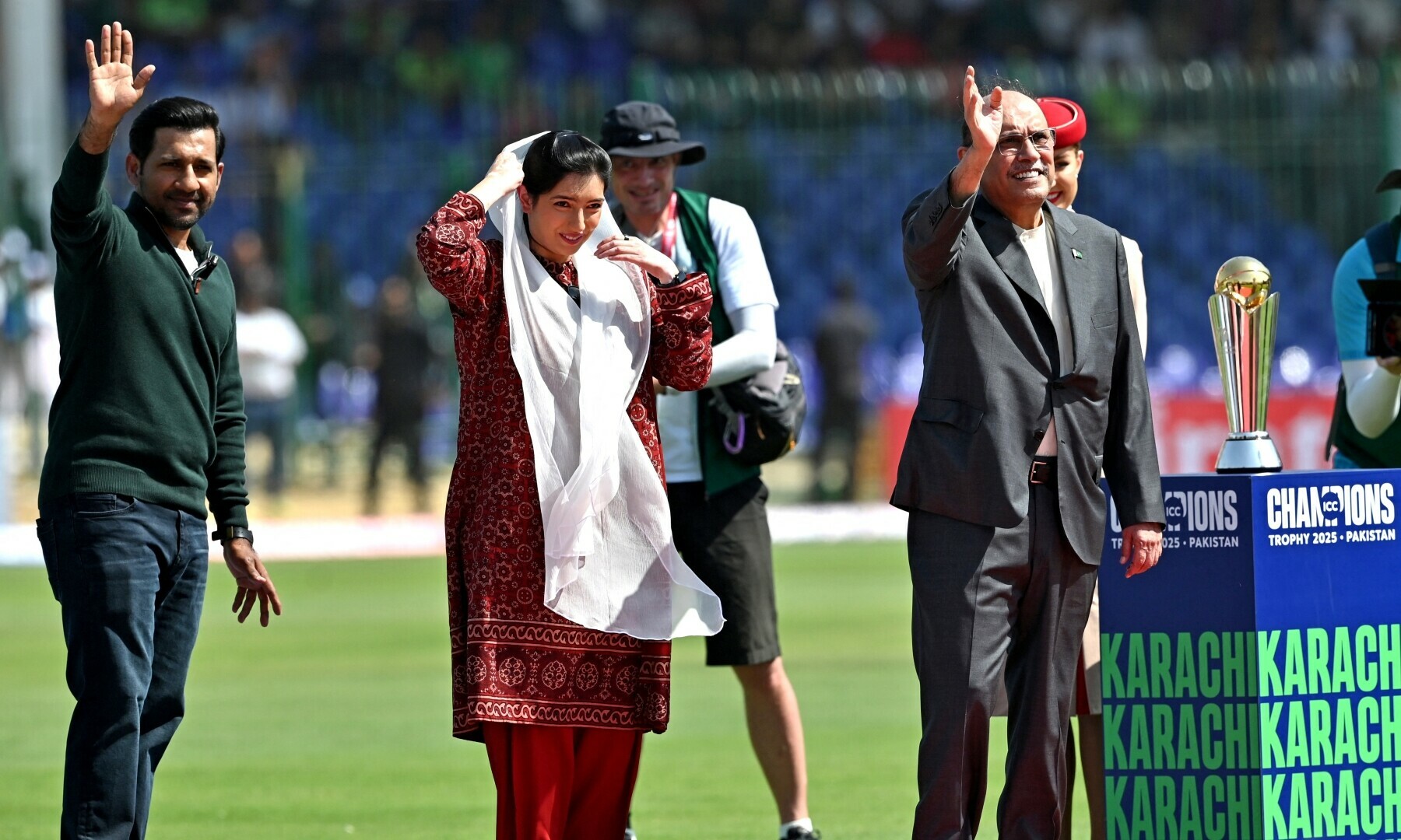  President Asif Ali Zardari, his daughter MNA Aseefa Bhutto-Zardari and former cricket captain Sarfraz Ahmed wave to the audience ahead of a Pakistan-New Zealand match at Karachi’s National Stadium on Feb 19, 2025. — AFP 