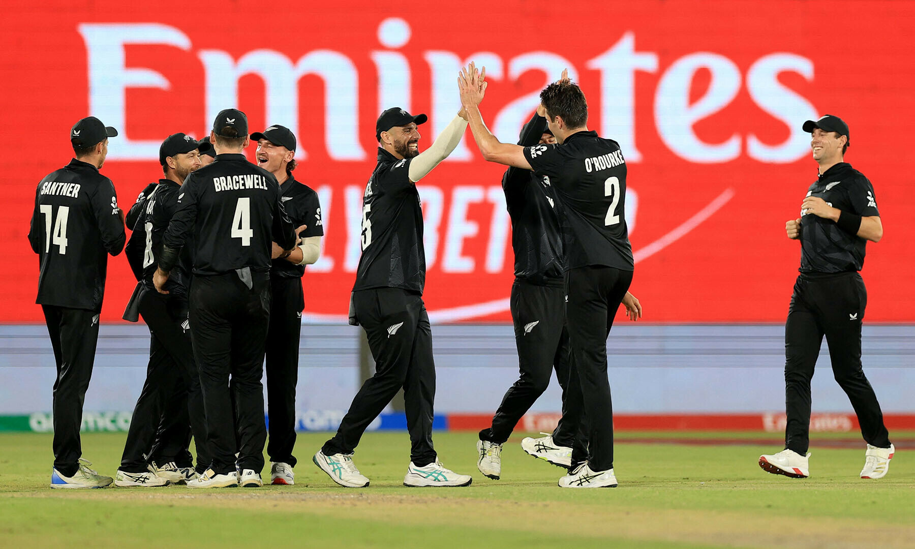  New Zealand’s Will O’Rourke celebrates with teammates after taking the wicket of Pakistan’s Mohammad Rizwan, caught out by Glenn Phillips. — Reuters 