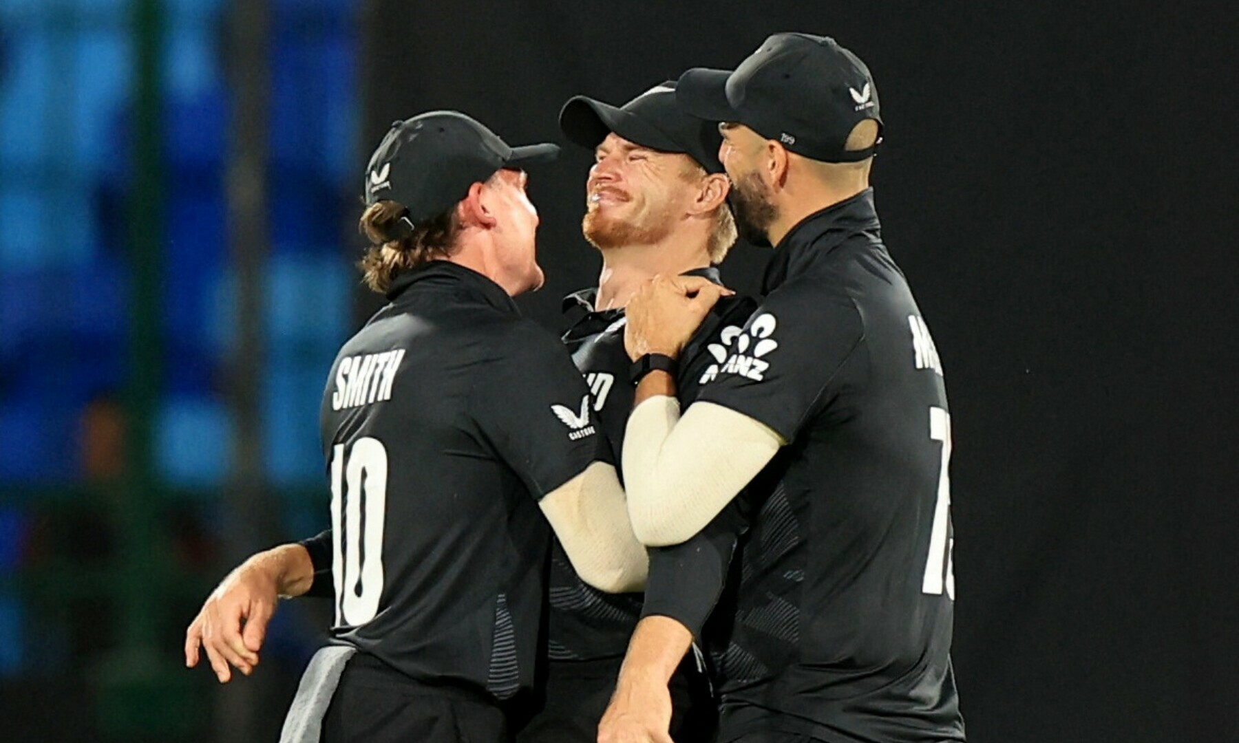  New Zealand’s Glenn Phillips celebrates with Nathan Smith and Daryl Mitchell after taking the catch to dismiss Pakistan’s Mohammad Rizwan, off the bowling of Will O’Rourke. — Reuters 