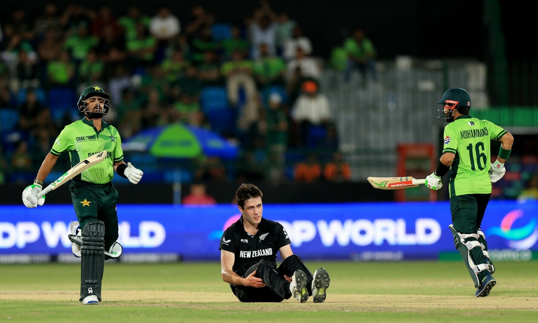  Mohammad Rizwan and Babar Azam in action as New Zealand’s Will O’Rourke reacts. — Reuters 
