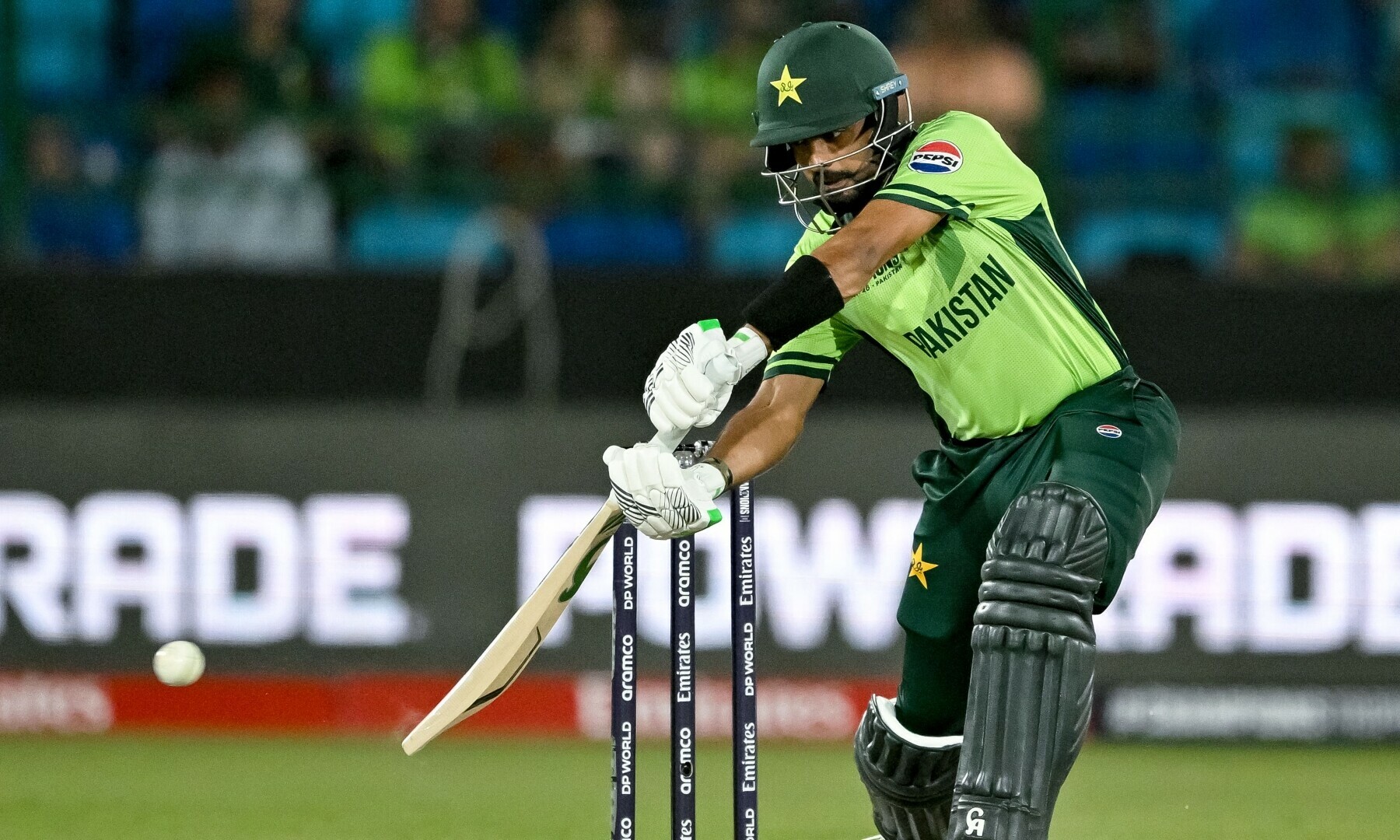  Babar Azam plays a shot during the ICC Champions Trophy cricket match between Pakistan and New Zealand at the National Stadium in Karachi on February 19. — AFP 