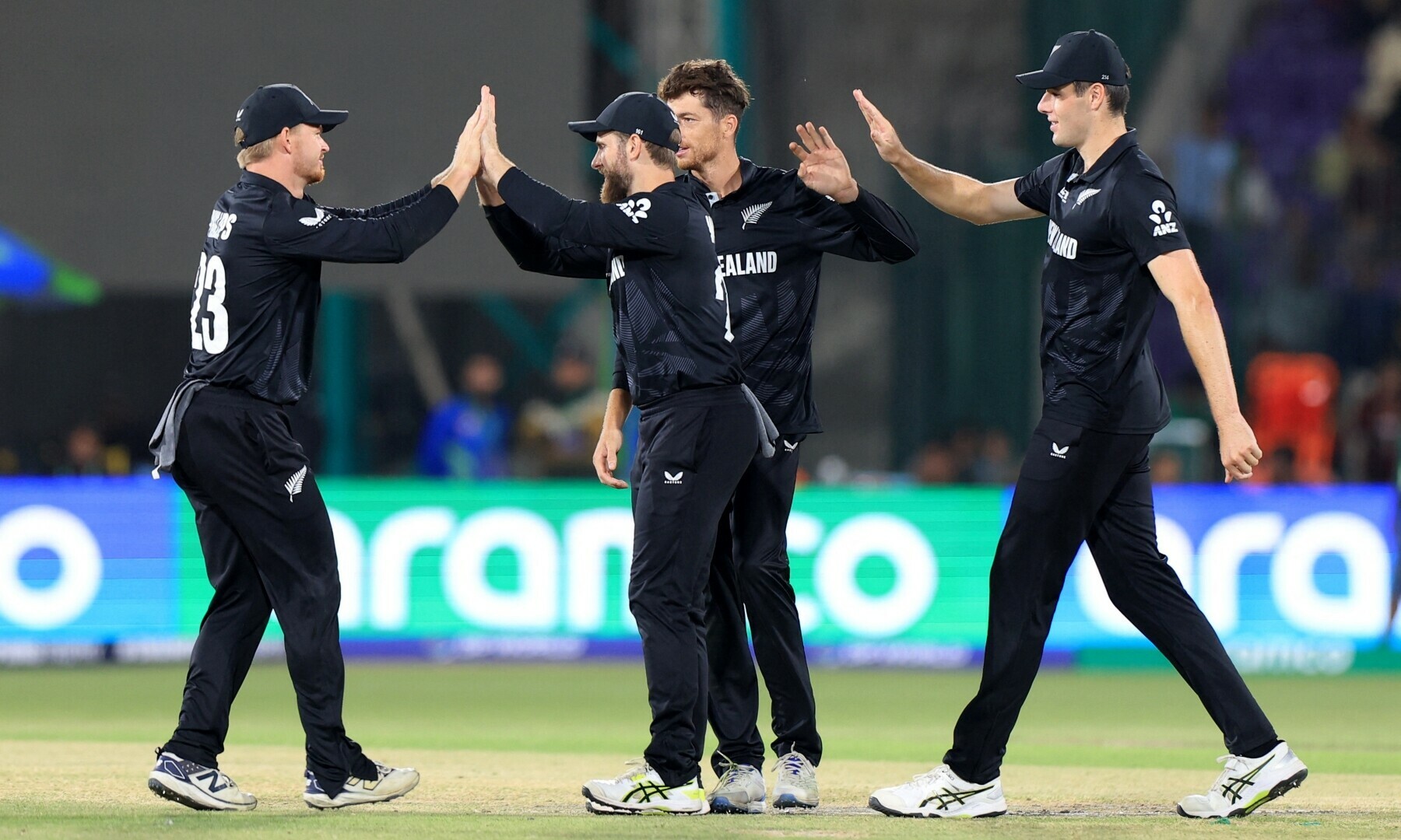  New Zealand’s Mitchell Santner celebrates with teammates after taking the wicket of Pakistan’s Tayyab Tahir, caught out by Kane Williamson. — Reuters 