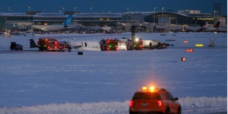 Delta plane flips upside down on landing at Toronto airport, injuring 18