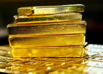 Gold set for seventh weekly gain as trade war risks lift demand