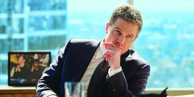 stephen amell plays ted black an old friend of harvey specter s from suits photo file