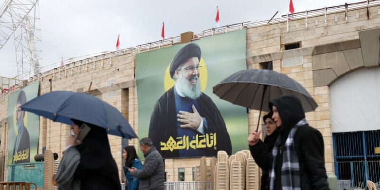 Tens of thousands vow support for Hezbollah at Beirut funeral of slain leader
