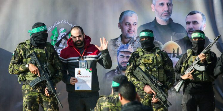 Two Israeli hostages released, one expected later in latest Gaza exchange