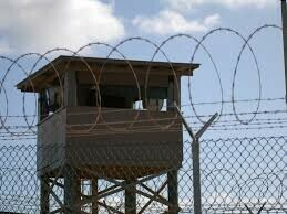 US flights carrying detained migrants to Guantanamo ‘underway’