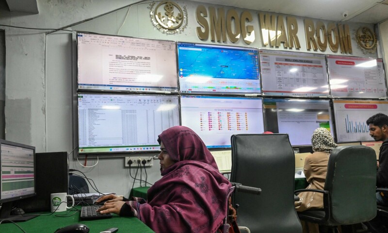  This photograph, taken on February 17, 202,5 shows Environment Protection Department (EPD) officials working at a Smog War Room as they monitor the air quality index in Lahore, one of the world’s most polluted city. — AFP 