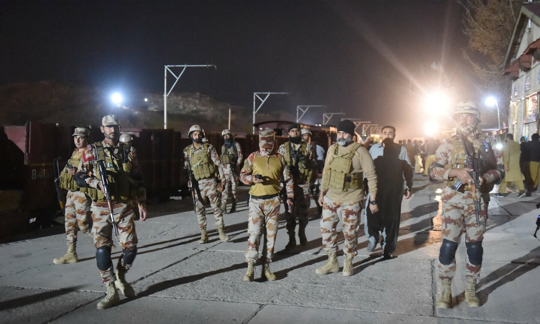  Soldiers secure Mach railway station after Pakistani security forces freed some passengers following a security operation against armed militants who ambushed the train in the remote mountainous area in Mach, Balochistan, on March 12, 2025. — AFP 