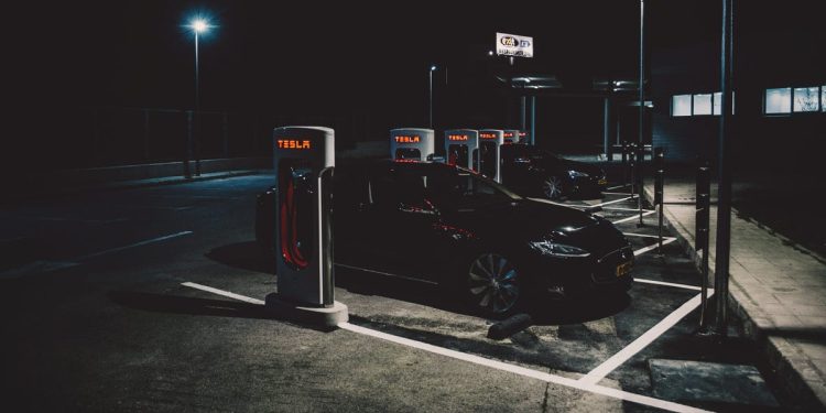 A Tesla Supercharging station was engulfed in flames. Police suspect arson.