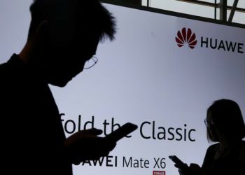 After years of survival, China’s Huawei returns to revenue peak