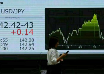 Asia shares steady; gold at record high as trade war ratchets up