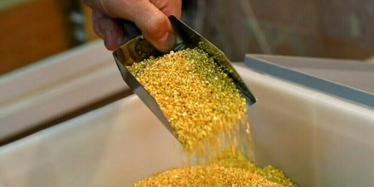 Gold hovers near record high on safe-haven demand; Fed decision in focus